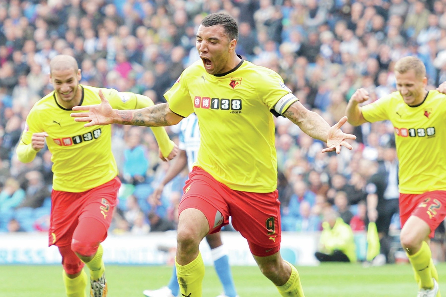 Troy Deeney celebrates scoring in play-off final 2015