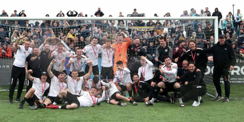 Marine players and fans celebrate promotion from the Northern Premier League last term