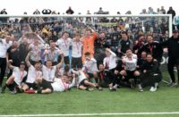 Marine players and fans celebrate promotion from the Northern Premier League last term